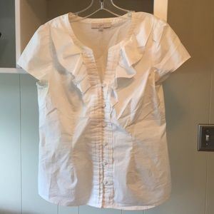 White ruffle blouse